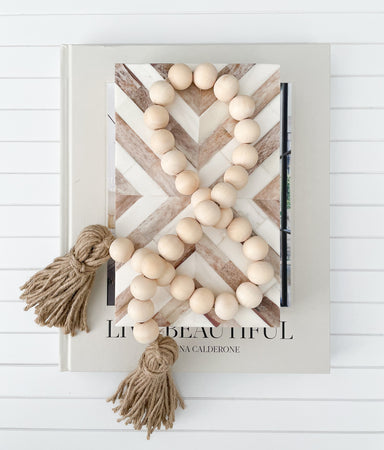 WHITE WASHED NATURAL WOODEN BEADS WITH JUTE TASSELS